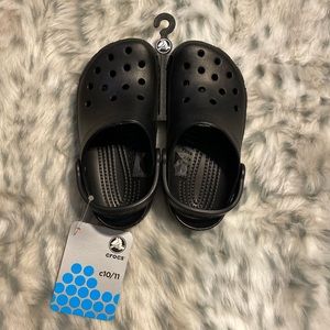 BRAND NEW IN BOX Crocs black toddler 10/11.  NWT
